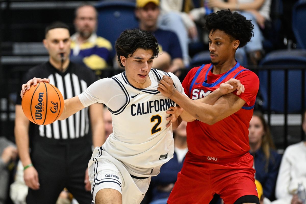 Feb 26, 2025; Berkeley, California, USA; California Golden Bears guard Andrej Stojakovic (2) dribbles against SMU Mustangs guard AJ George (10) in the second half at Haas Pavilion. Mandatory Credit: Eakin Howard-Imagn Images
