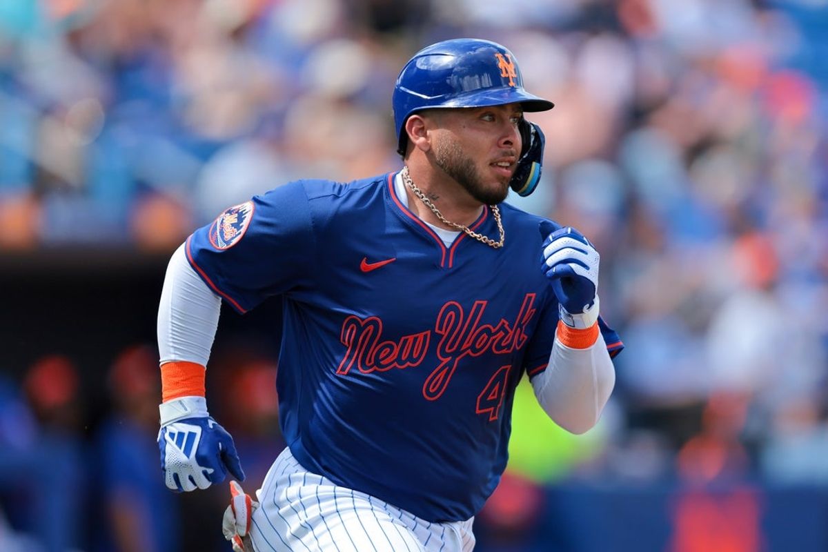 Feb 27, 2025; Port St. Lucie, Florida, USA; New York Mets catcher Francisco Alvarez (4) runs to first base after hitting a single against the Houston Astros during the first inning at Clover Park. Mandatory Credit: Sam Navarro-Imagn Images