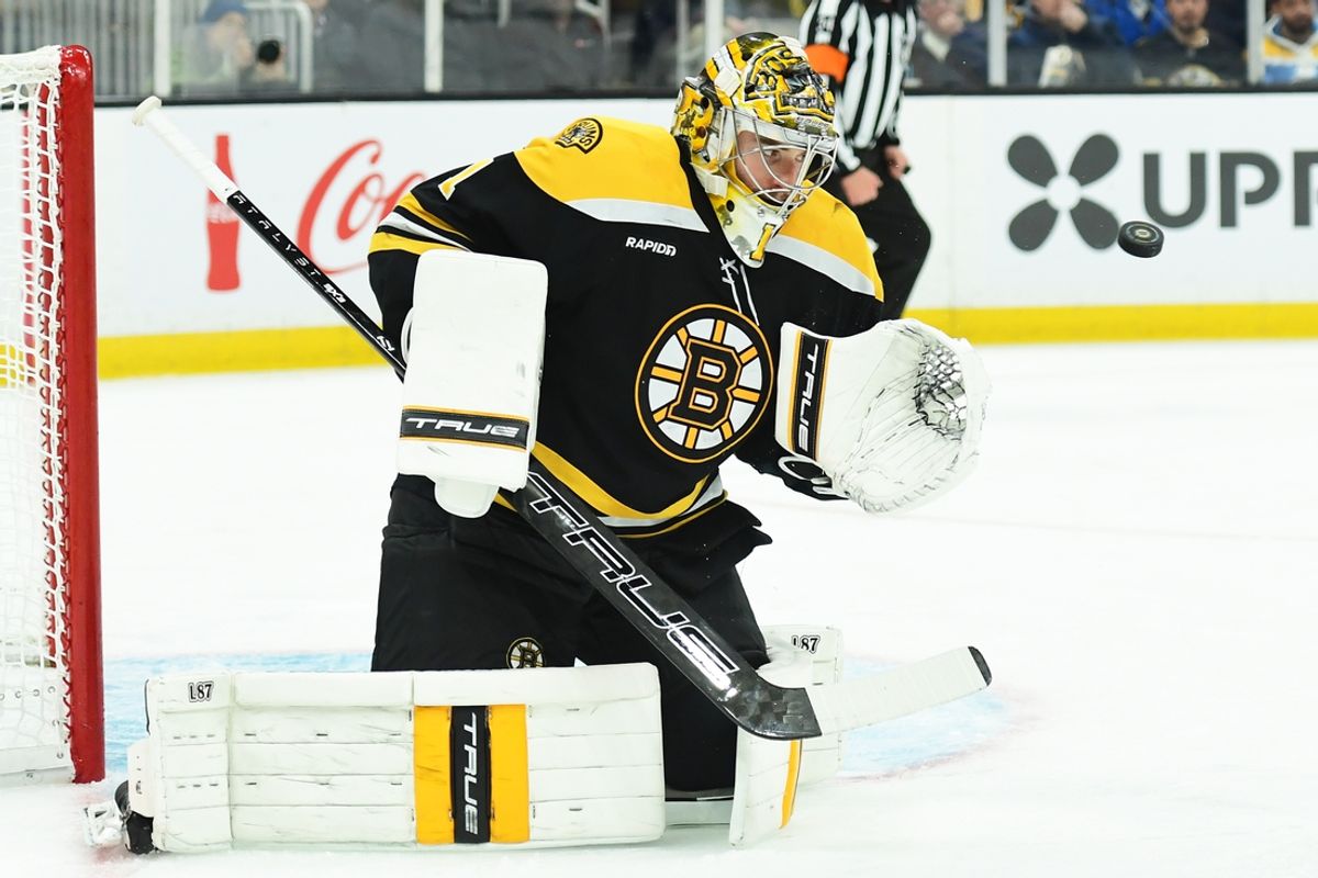 Feb 27, 2025; Boston, Massachusetts, USA; Boston Bruins goaltender Jeremy Swayman (1) makes a save during the second period against the New York Islanders at TD Garden. Mandatory Credit: Bob DeChiara-Imagn Images