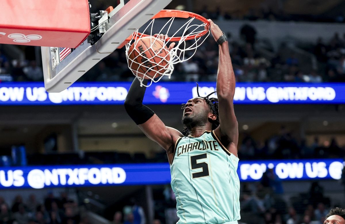 Feb 27, 2025; Dallas, Texas, USA;  Charlotte Hornets center Mark Williams (5) dunks against the Dallas Mavericks during the first half at American Airlines Center. Mandatory Credit: Kevin Jairaj-Imagn Images