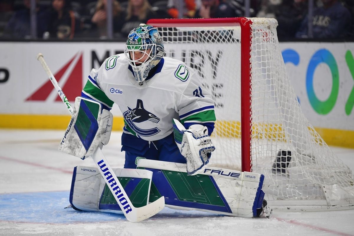 Feb 27, 2025; Anaheim, California, USA; Vancouver Canucks goaltender Arturs Silovs (31) defends the goal against the Anaheim Ducks during the second period at Honda Center. Mandatory Credit: Gary A. Vasquez-Imagn Images
