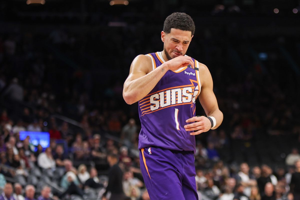 Feb 27, 2025; Phoenix, Arizona, USA; Phoenix Suns guard Devin Booker (1) reacts after being fouled by the New Orleans Pelicans in the fourth quarter at Footprint Center. Mandatory Credit: Brett Davis-Imagn Images