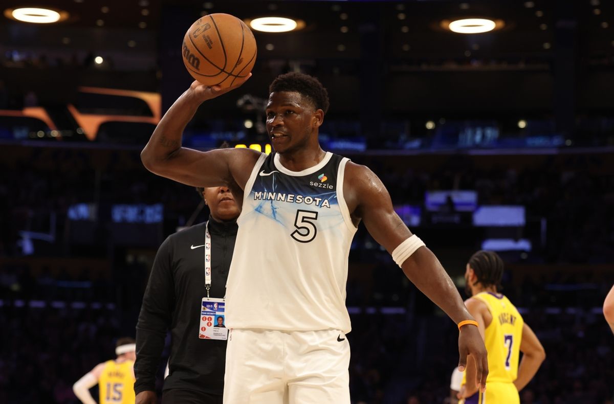Feb 27, 2025; Los Angeles, California, USA; Minnesota Timberwolves guard Anthony Edwards (5) reacts after being ejected during the third quarter against the Los Angeles Lakers at Crypto.com Arena. Mandatory Credit: Jason Parkhurst-Imagn Images