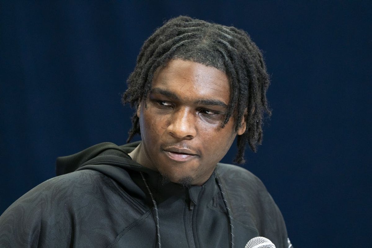 Feb 28, 2025; Indianapolis, IN, USA;Miami quarterback Cam Ward (QB15) talks to the press during the 2025 NFL Combine at Indiana Convention Center. Mandatory Credit: Stephanie Amador Blondet-Imagn Images
