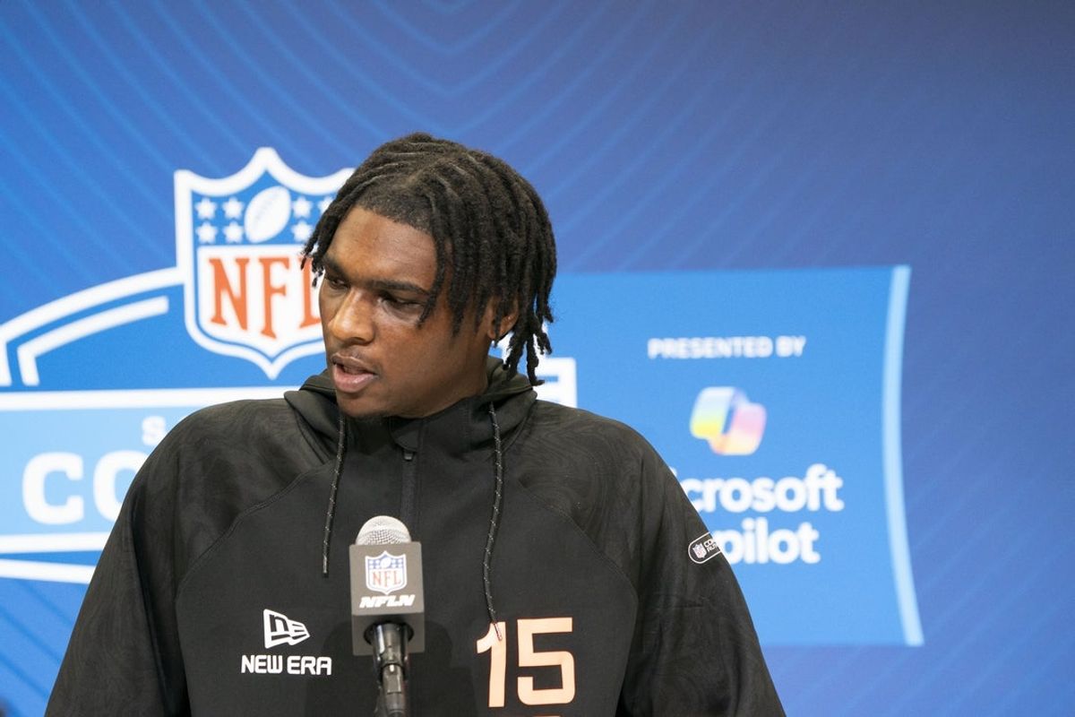 Feb 28, 2025; Indianapolis, IN, USA;Miami quarterback Cam Ward (QB15) talks to the press during the 2025 NFL Combine at Indiana Convention Center. Mandatory Credit: Stephanie Amador Blondet-Imagn Images