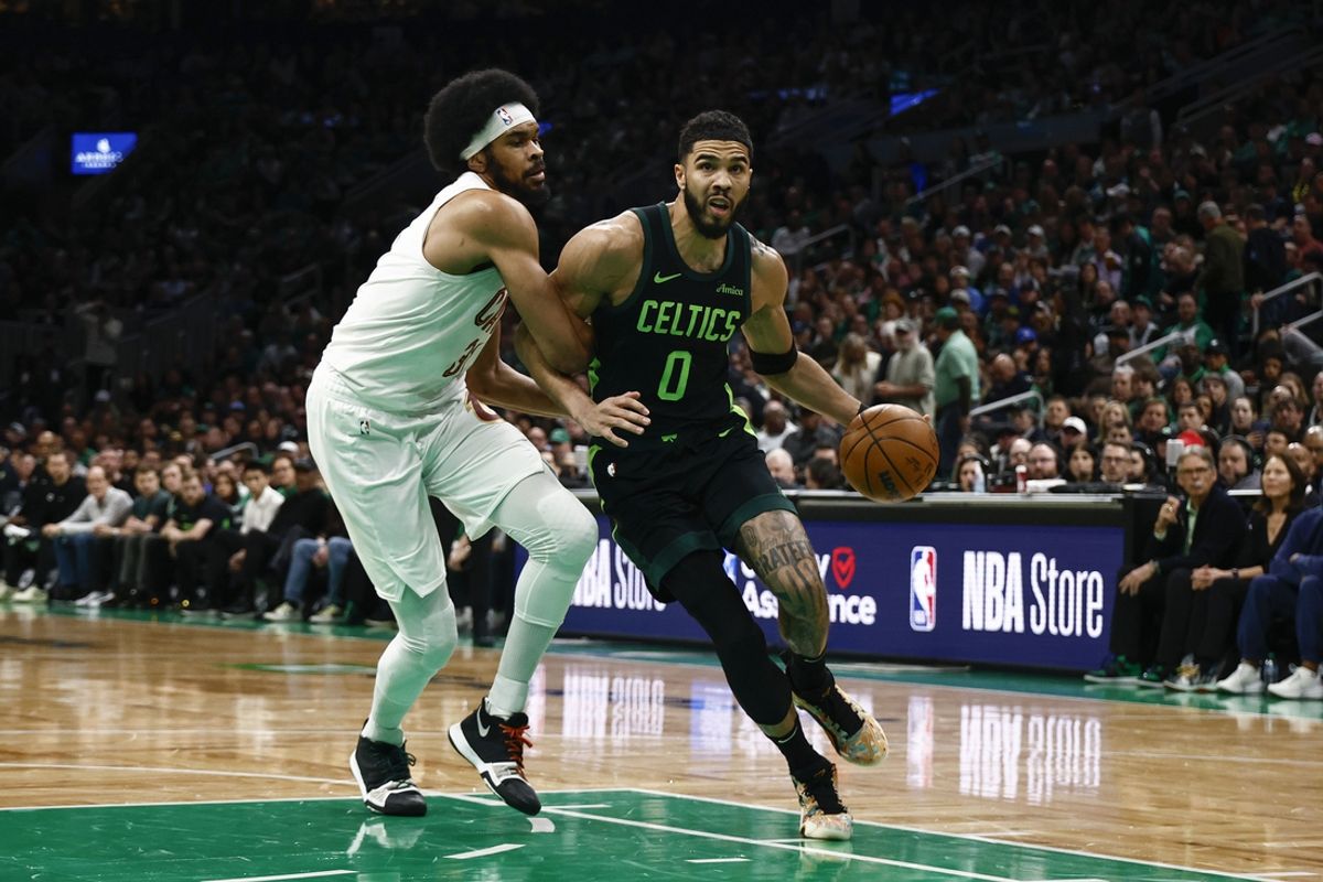Feb 28, 2025; Boston, Massachusetts, USA; Cleveland Cavaliers center Jarrett Allen (31) tries to hold up Boston Celtics forward Jayson Tatum (0) during the first quarter at TD Garden. Mandatory Credit: Winslow Townson-Imagn Images