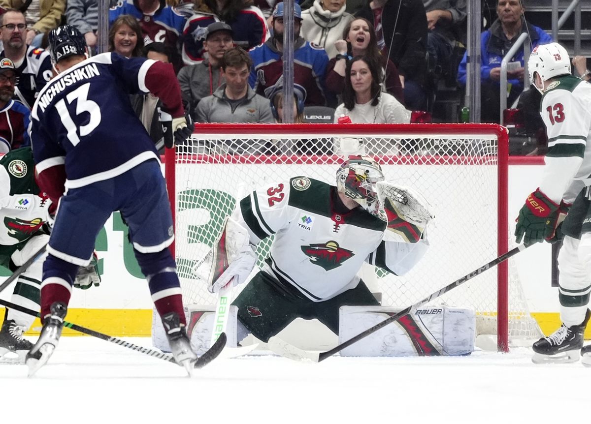 Feb 28, 2025; Denver, Colorado, USA; Minnesota Wild goaltender Filip Gustavsson (32) allows a goal by Colorado Avalanche right wing Valeri Nichushkin (13) in the first period at Ball Arena. Mandatory Credit: Ron Chenoy-Imagn Images