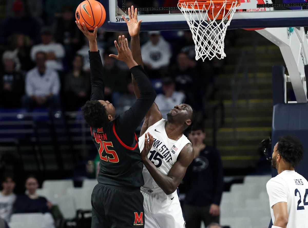 Mar 1, 2025; University Park, Pennsylvania, USA; Penn State Nittany Lions forward Kachi Nzeh (15) defends as Maryland Terrapins  center Derik Queen (25) shoots the ball during the first half at Bryce Jordan Center. Mandatory Credit: Matthew O'Haren-Imagn Images