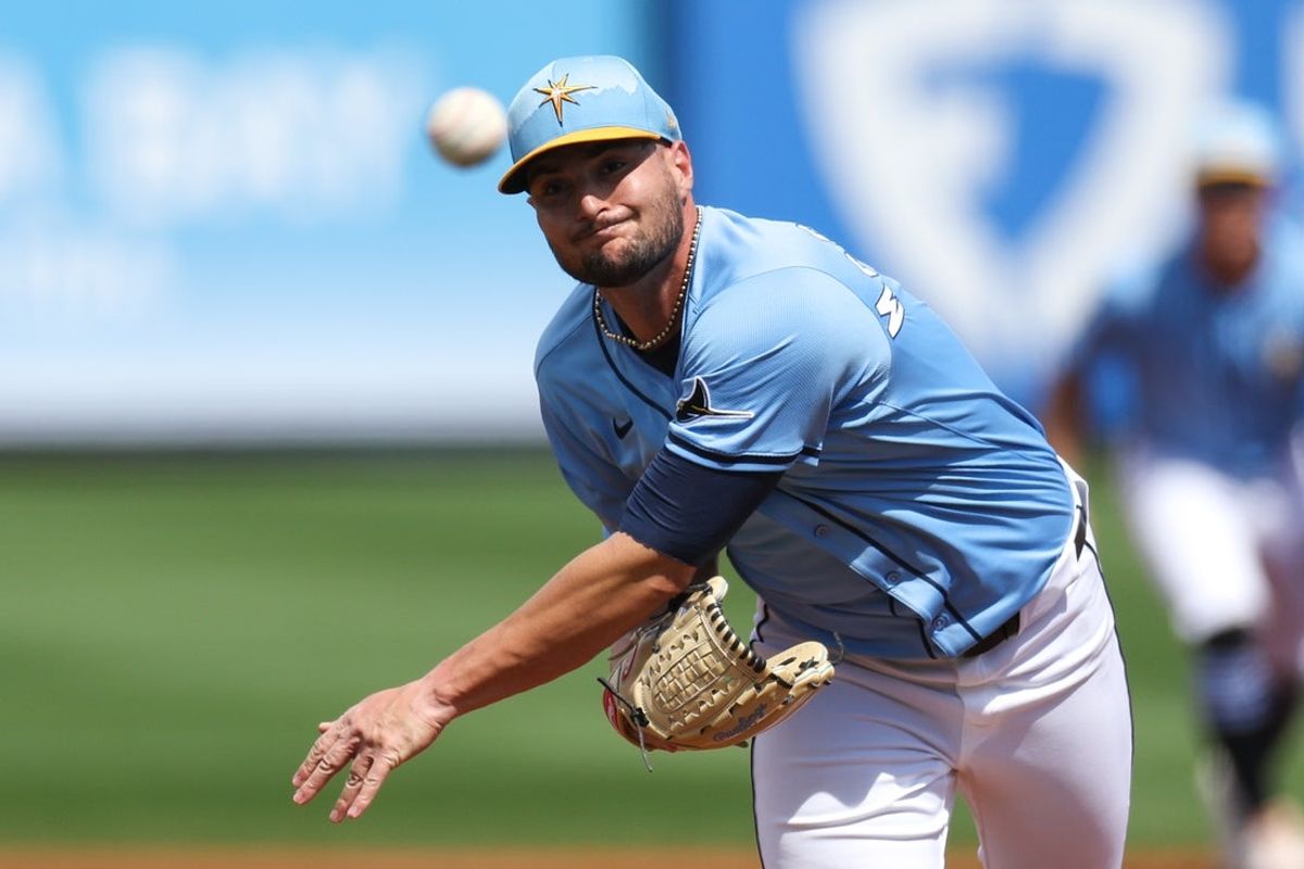 Mar 1, 2025; Port Charlotte, Florida, USA; Tampa Bay Rays pitcher Shane McClanahan (18) throws a pitch against the New York Mets in the second inning during spring training at Charlotte Sports Park. Mandatory Credit: Nathan Ray Seebeck-Imagn Images