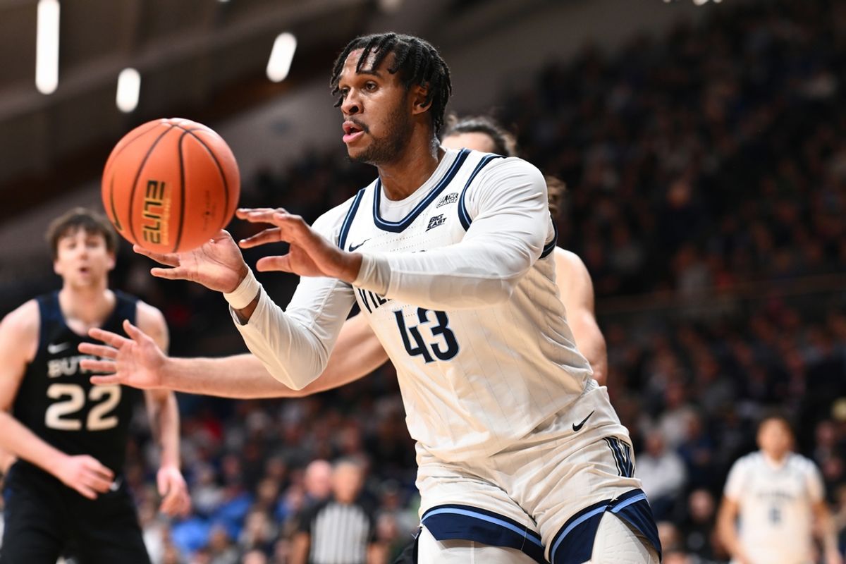 Mar 1, 2025; Villanova, Pennsylvania, USA; Villanova Wildcats forward Eric Dixon (43) passes the ball against the Butler Bulldogs in the first half at William B. Finneran Pavilion. Mandatory Credit: Kyle Ross-Imagn Images