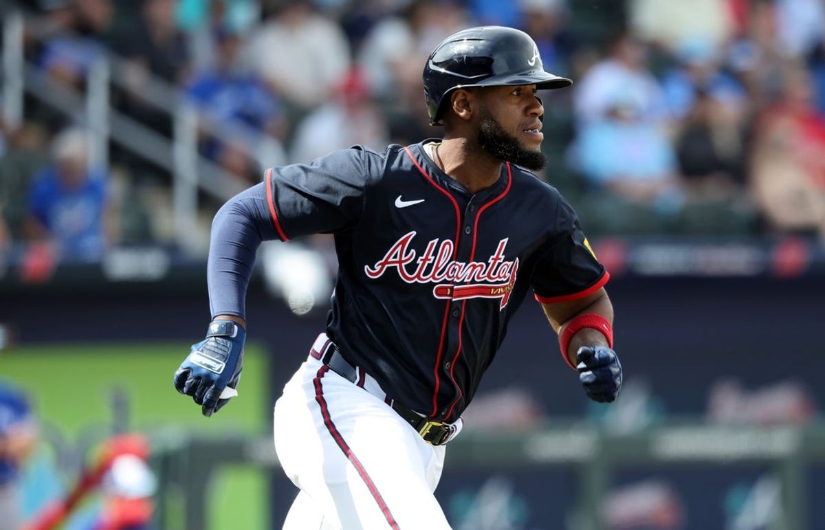 Mar 1, 2025; North Port, Florida, USA;  Atlanta Braves outfield Bryan De La Cruz (14) singles during the fifth inning against the Toronto Blue Jays at CoolToday Park. Mandatory Credit: Kim Klement Neitzel-Imagn Images