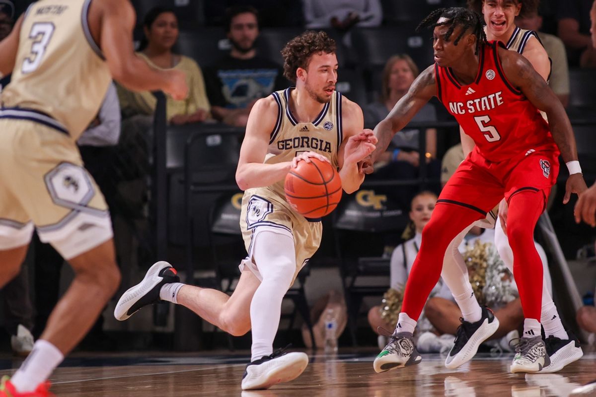 Mar 1, 2025; Atlanta, Georgia, USA; Georgia Tech Yellow Jackets guard Lance Terry (0) drives to the basket against the North Carolina State Wolfpack in the first half at McCamish Pavilion. Mandatory Credit: Brett Davis-Imagn Images