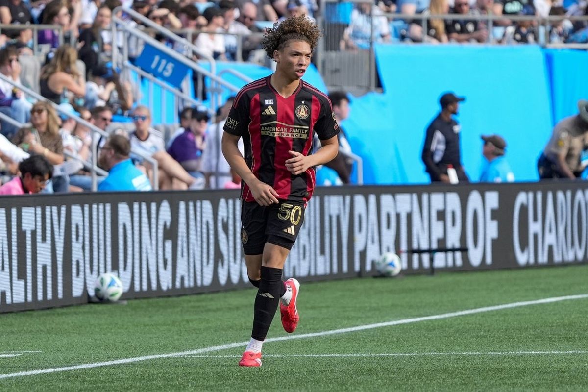 Mar 1, 2025; Charlotte, North Carolina, USA; Atlanta United defender Dominik Chong Qui (50) makes his way down field against Charlotte FC during the second half  at Bank of America Stadium. Mandatory Credit: Jim Dedmon-Imagn Images