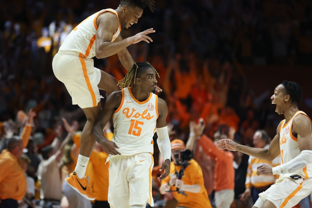 Mar 1, 2025; Knoxville, Tennessee, USA; Tennessee Volunteers guard Chaz Lanier (2) and guard Jordan Gainey (11) celebrate with guard Jahmai Mashack (15) Mashack after hitting a game winning three pointer against the Alabama Crimson Tide at Thompson-Boling Arena at Food City Center. Mandatory Credit: Randy Sartin-Imagn Images