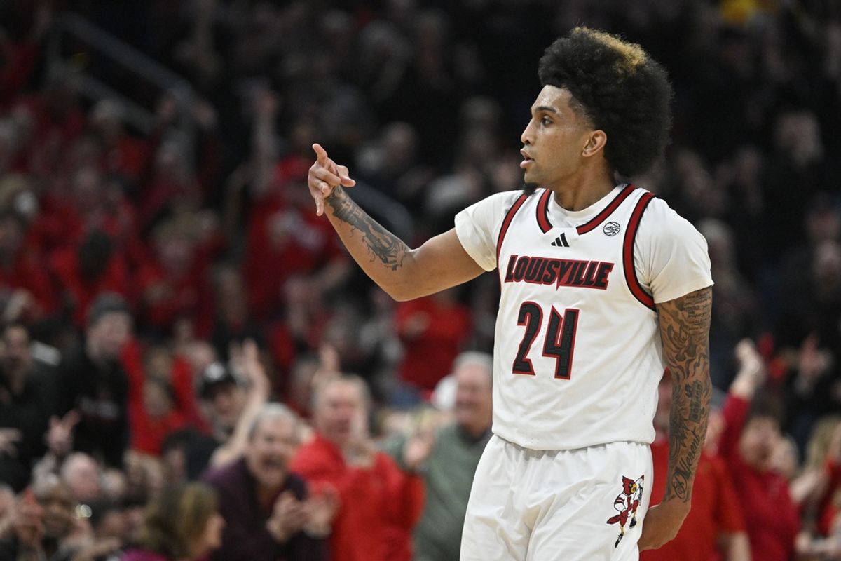 Mar 1, 2025; Louisville, Kentucky, USA;  Louisville Cardinals guard Chucky Hepburn (24) reacts after making a  three pointer against the Pittsburgh Panthers during the first half at KFC Yum! Center. Mandatory Credit: Jamie Rhodes-Imagn Images