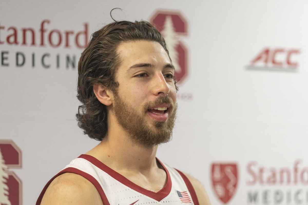 Mar 1, 2025; Stanford, California, USA;  Stanford Cardinal guard Benny Gealer (5) speaks to the media after the game against the Southern Methodist Mustangs at Maples Pavilion. Mandatory Credit: Stan Szeto-Imagn Images