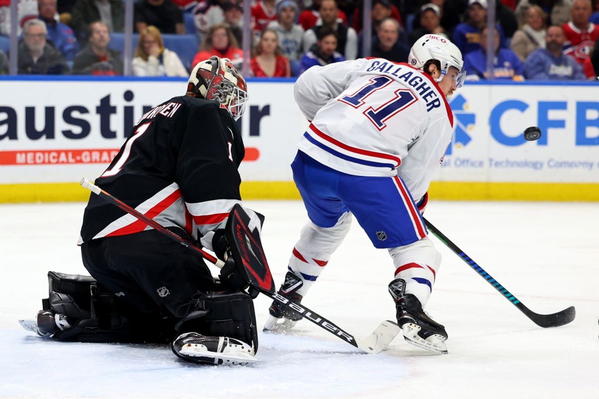 Mar 1, 2025; Buffalo, New York, USA;  Montreal Canadiens right wing Brendan Gallagher (11) looks to deflect a shot on Buffalo Sabres goaltender Ukko-Pekka Luukkonen (1) during the first period at KeyBank Center. Mandatory Credit: Timothy T. Ludwig-Imagn Images