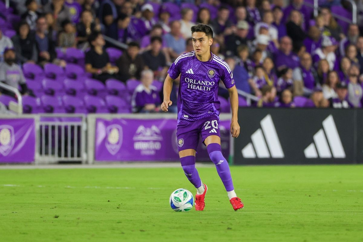 Mar 1, 2025; Orlando, Florida, USA; Orlando City defender Alex Freeman (30) dribbles the ball during the first half against Toronto FC at Inter&Co Stadium. Mandatory Credit: Mike Watters-Imagn Images