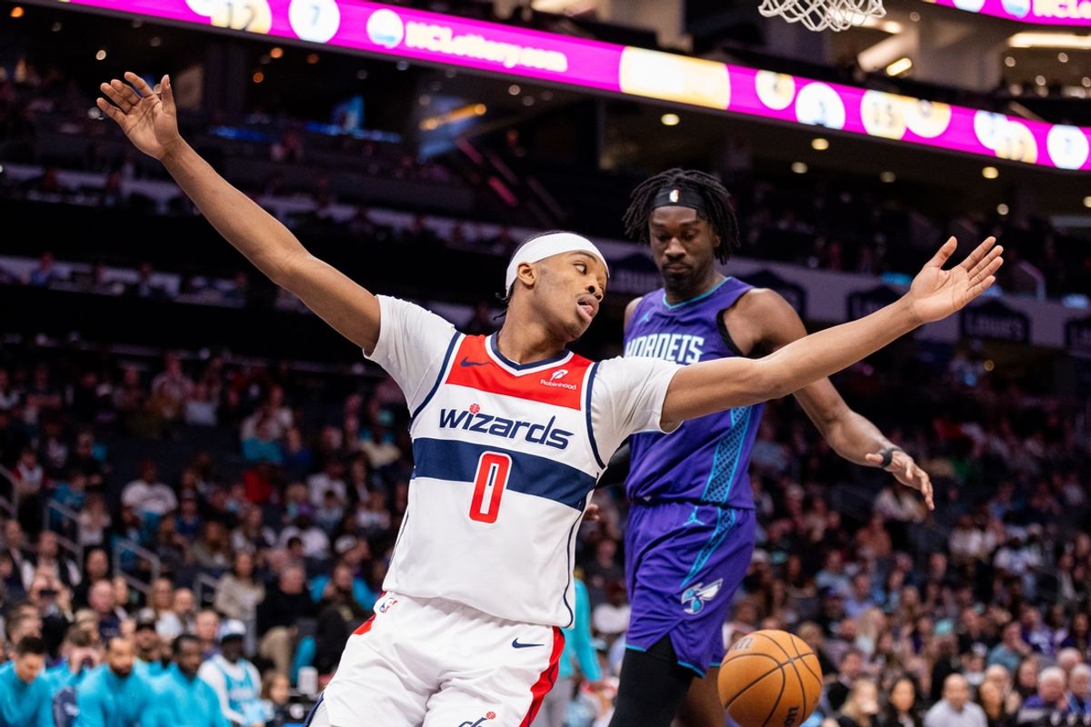 Mar 1, 2025; Charlotte, North Carolina, USA; Washington Wizards guard Bilal Coulibaly (0) celebrates after scoring against the Charlotte Hornets during the fourth quarter at Spectrum Center. Mandatory Credit: Scott Kinser-Imagn Images