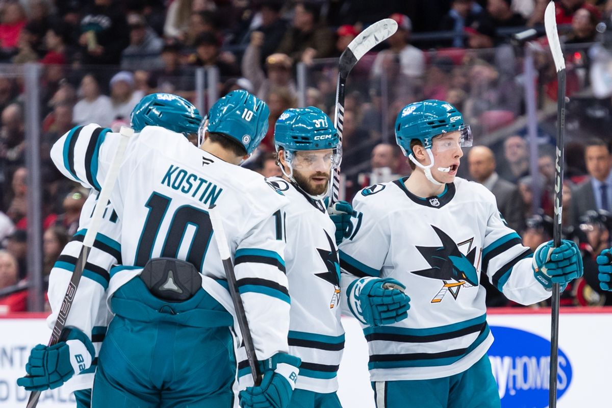 Mar 1, 2025; Ottawa, Ontario, CAN; The San Jose Sharks celebrate a goal scored by defenseman Timothy Lijegren (37) in the second period against the Ottawa Senators at the Canadian Tire Centre. Mandatory Credit: Marc DesRosiers-Imagn Images