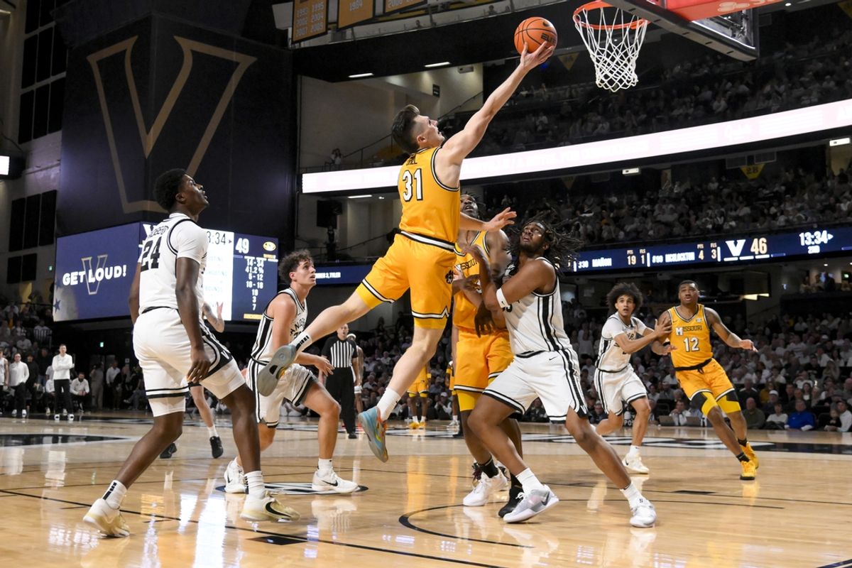 Mar 1, 2025; Nashville, Tennessee, USA;  Missouri Tigers guard Caleb Grill (31) lays the ball in  against the Vanderbilt Commodores during the second half at Memorial Gymnasium. Mandatory Credit: Steve Roberts-Imagn Images