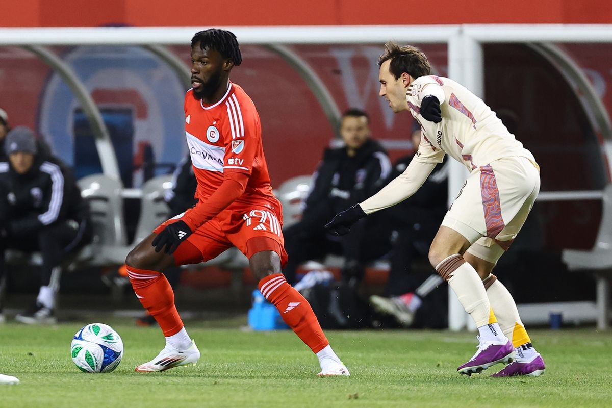 Mar 1, 2025; Chicago, Illinois, USA; Chicago Fire FC midfielder Jonathan Bamba (19) kicks the ball against D.C. United during the first half at Soldier Field. Mandatory Credit: Mike Dinovo-Imagn Images