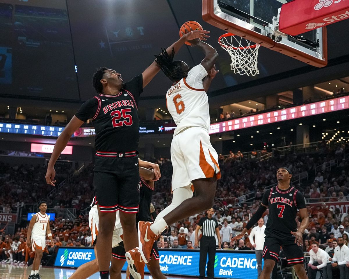 Texas Longhorns forward Arthur Kaluma (6) shoots the ball past Georgia forward Justin Abson (25) during the game at the Moody Center on Saturday, March 1, 2025.