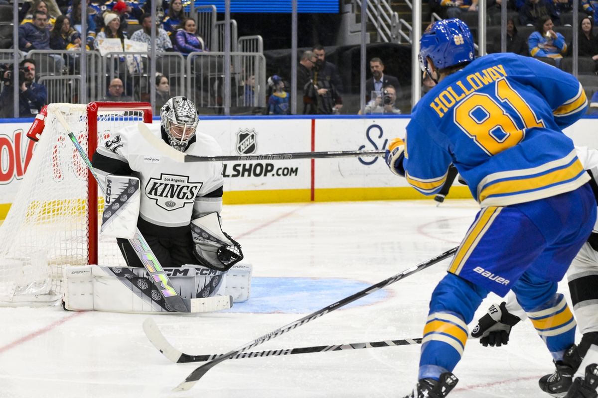 Mar 1, 2025; St. Louis, Missouri, USA;  Los Angeles Kings goaltender David Rittich (31) makes a save against St. Louis Blues center Dylan Holloway (81) during the second period at Enterprise Center. Mandatory Credit: Jeff Curry-Imagn Images