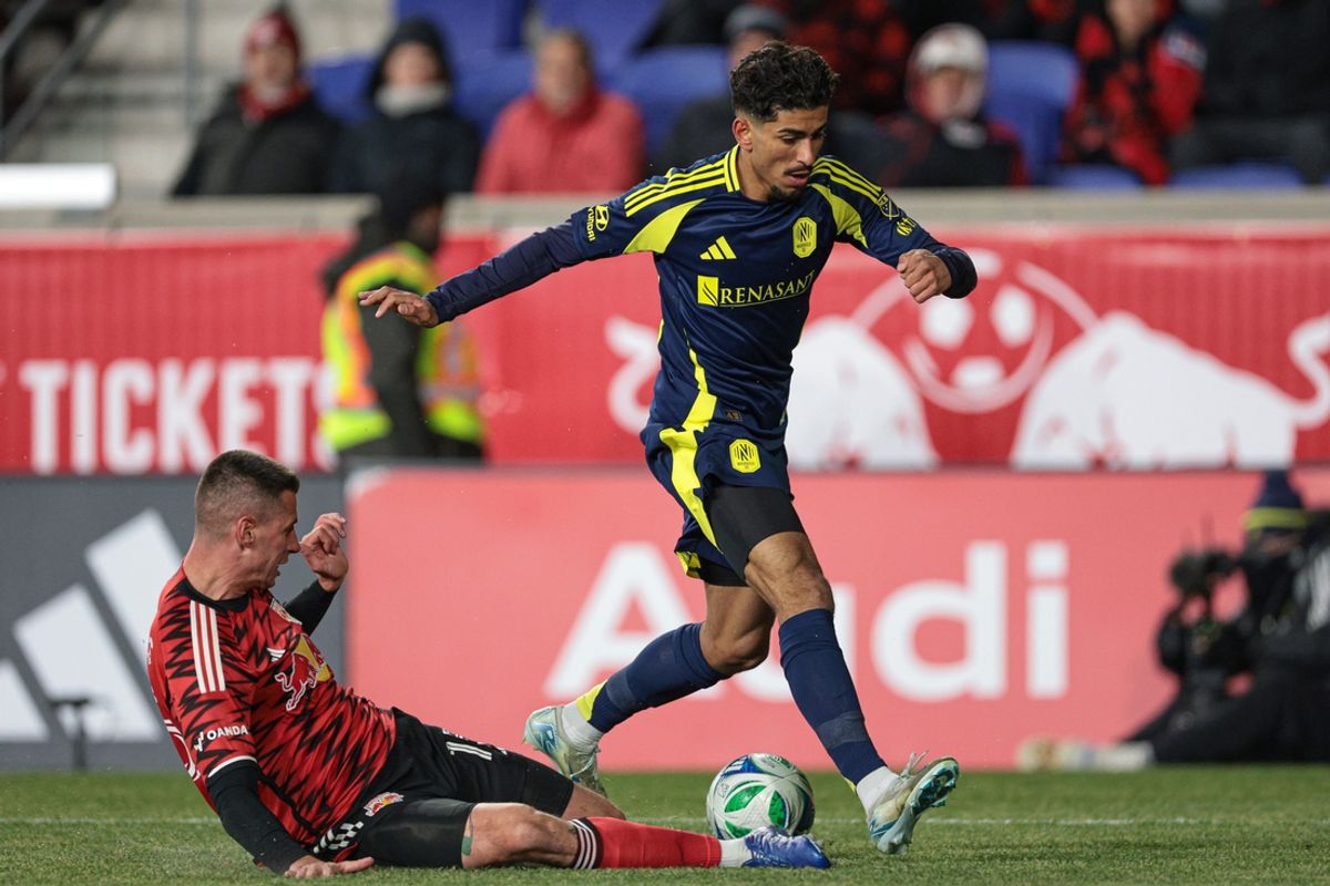 Mar 1, 2025; Harrison, New Jersey, USA; Nashville SC midfielder Ahmad Qasem (37) plays the ball against New York Red Bulls defender Sean Nealis (15) during the second half at Sports Illustrated Stadium. Mandatory Credit: Vincent Carchietta-Imagn Images