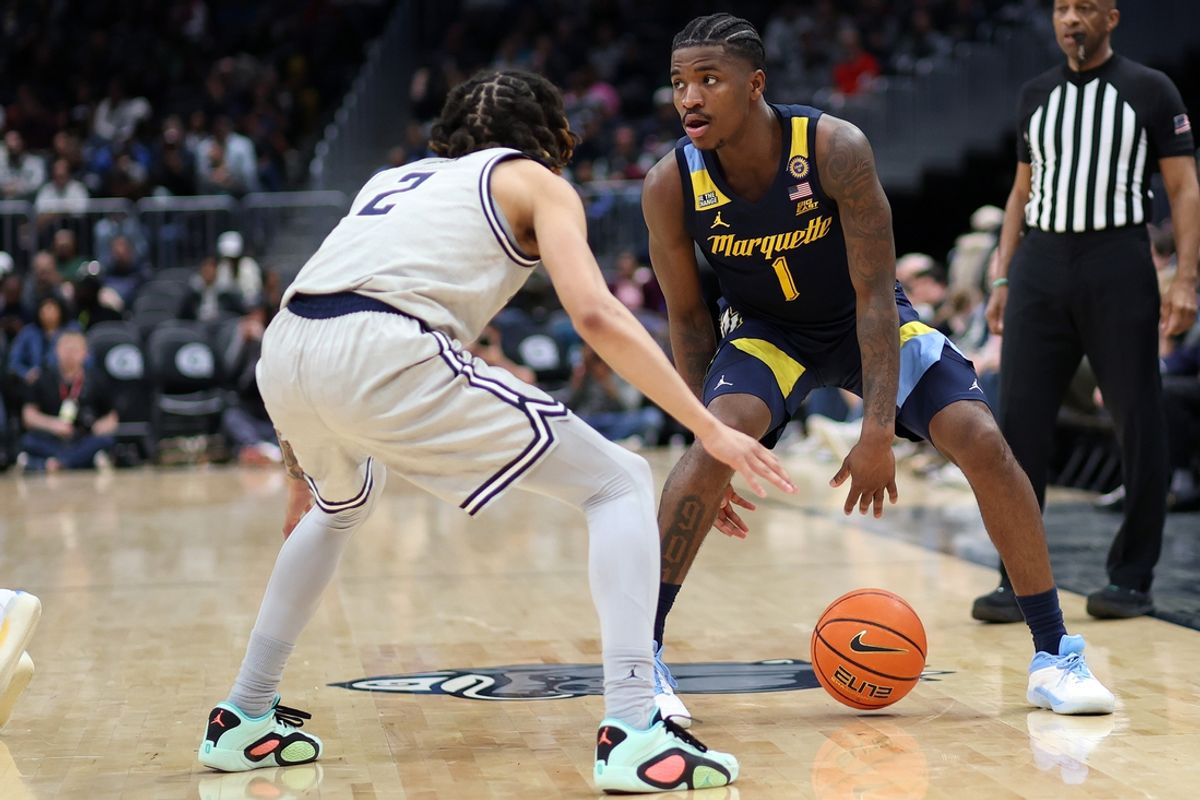 Mar 1, 2025; Washington, District of Columbia, USA; Marquette Golden Eagles guard Kam Jones (1) dribbles the ball around Georgetown Hoyas guard Malik Mack (2) during the second half at Capital One Arena. Mandatory Credit: Daniel Kucin Jr.-Imagn Images