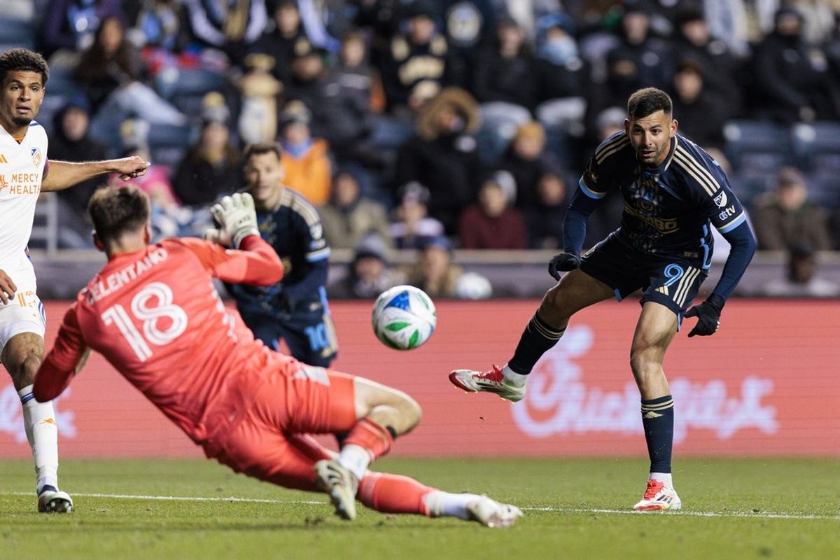 Mar 1, 2025; Chester, Pennsylvania, USA; Philadelphia Union forward Tai Baribo (9) shoots against FC Cincinnati goalkeeper Roman Celentano (18) during the second half at Subaru Park. Mandatory Credit: Caean Couto-Imagn Images