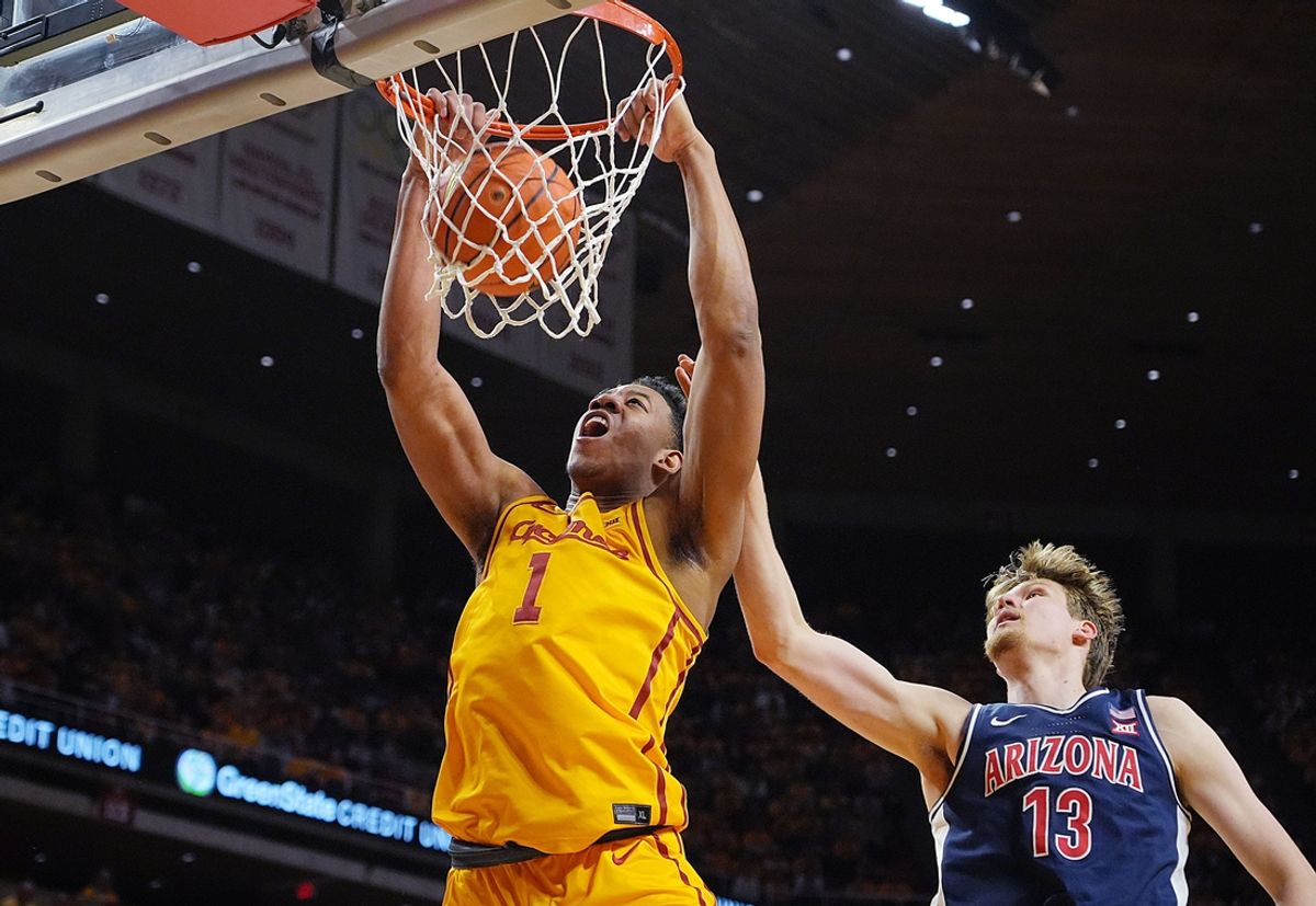 Iowa State Cyclones center Dishon Jackson (1) dunks the ball around Arizona Wildcats forward Henri Veesaar (13) during the first half in the Big-12 men’s basketball showdown at Hilton Coliseum on Saturday March 1, 2025 in Ames, Iowa.