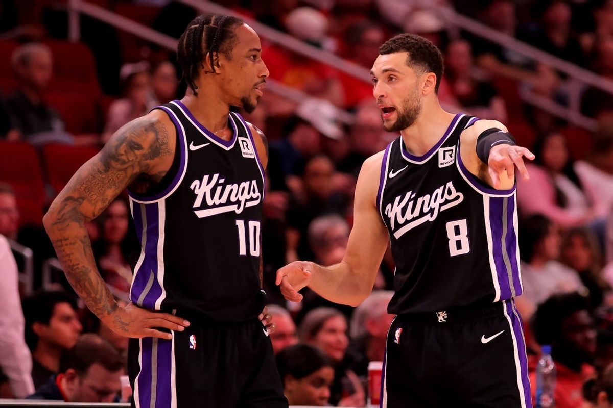 Mar 1, 2025; Houston, Texas, USA; Sacramento Kings forward DeMar DeRozan (10) talks with guard Zach LaVine (8) during a timeout against the Houston Rockets during the third quarter at Toyota Center. Mandatory Credit: Erik Williams-Imagn Images