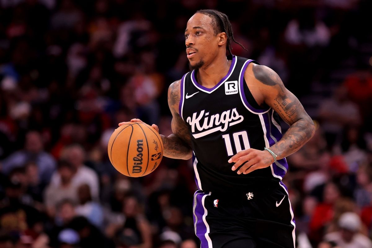 Mar 1, 2025; Houston, Texas, USA; Sacramento Kings forward DeMar DeRozan (10) handles the ball against the Houston Rockets during the fourth quarter at Toyota Center. Mandatory Credit: Erik Williams-Imagn Images