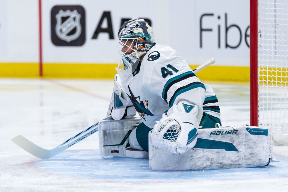 Mar 1, 2025; Ottawa, Ontario, CAN; San Jose Sharks goalie Vitek Vanecek (41) stretches prior to the start of game against the Ottawa Senators at the Canadian Tire Centre. Mandatory Credit: Marc DesRosiers-Imagn Images