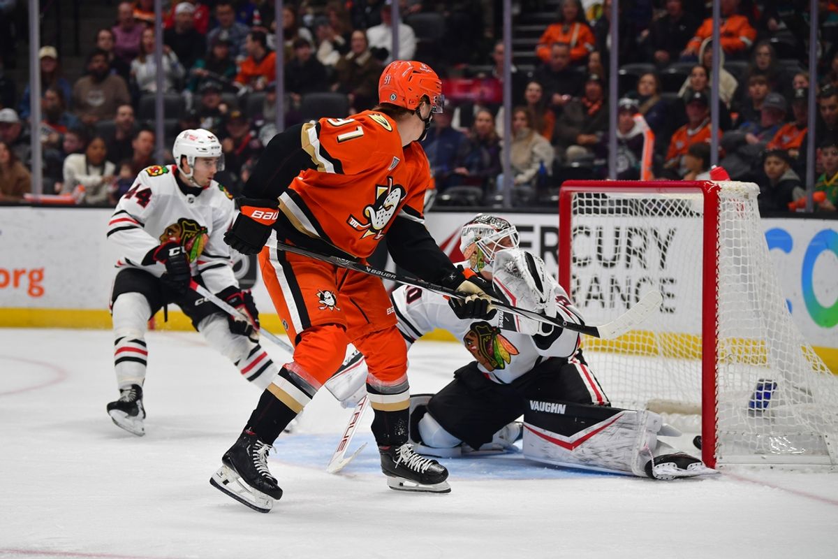 Mar 1, 2025; Anaheim, California, USA; Anaheim Ducks center Leo Carlsson (91) scores a goal against Chicago Blackhawks goaltender Arvid Soderblom (40) during the second period at Honda Center. Mandatory Credit: Gary A. Vasquez-Imagn Images