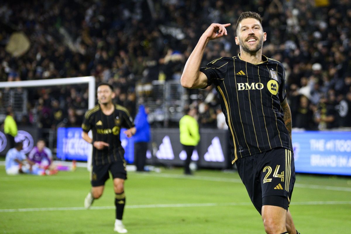 Mar 1, 2025; Los Angeles, California, USA; Los Angeles FC defender Ryan Hollingshead (24) celebrates his goal during the second half against New York City FC at BMO Stadium. Mandatory Credit: Kelvin Kuo-Imagn Images