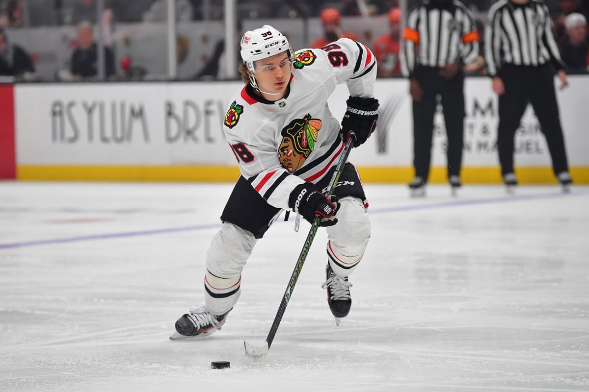 Mar 1, 2025; Anaheim, California, USA; Chicago Blackhawks center Connor Bedard (98) controls the puck against the Anaheim Ducks during the third period at Honda Center. Mandatory Credit: Gary A. Vasquez-Imagn Images