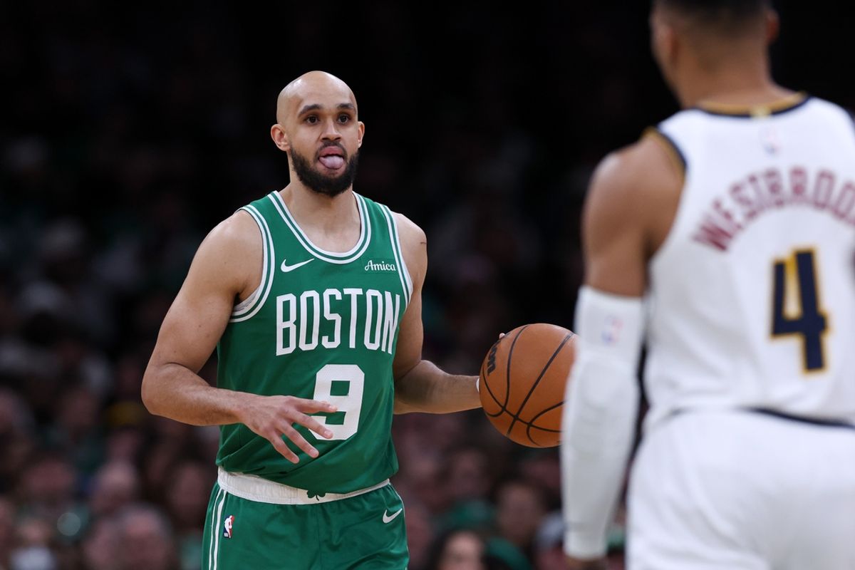 Mar 2, 2025; Boston, Massachusetts, USA; Boston Celtics guard Derrick White (9) dribbles down the court during the second half against the Denver Nuggets at TD Garden. Mandatory Credit: Paul Rutherford-Imagn Images