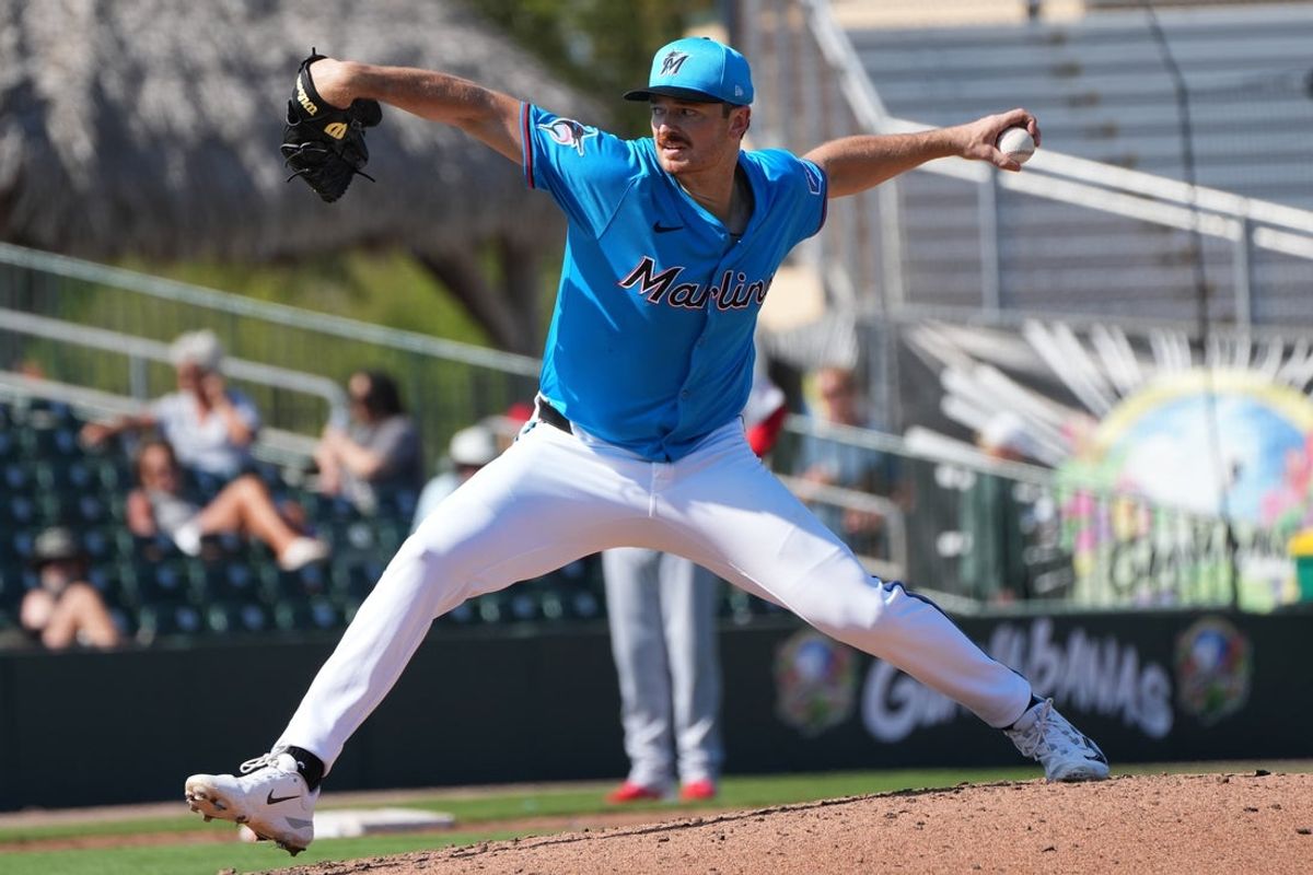 Mar 2, 2025; Jupiter, Florida, USA;  Miami Marlins pitcher John Rooney (79) pitches in the sixth inning against the St. Louis Cardinals at Roger Dean Chevrolet Stadium. Mandatory Credit: Jim Rassol-Imagn Images