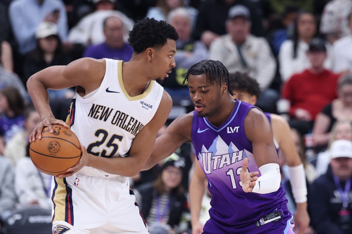 Mar 2, 2025; Salt Lake City, Utah, USA; New Orleans Pelicans guard Trey Murphy III (25) looks to move the ball against Utah Jazz guard Isaiah Collier (13) during the first half at Delta Center. Mandatory Credit: Rob Gray-Imagn Images