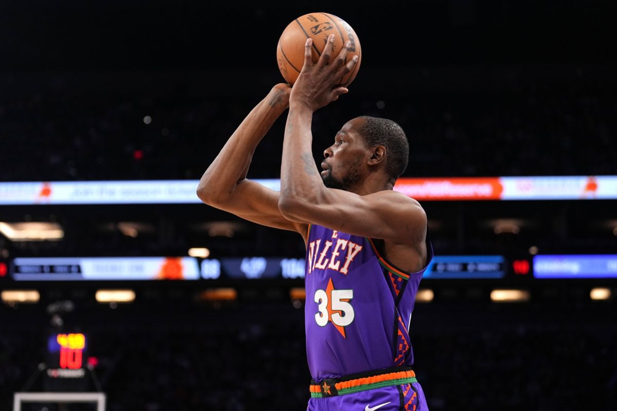 Mar 2, 2025; Phoenix, Arizona, USA; Phoenix Suns forward Kevin Durant (35) shoots against the Minnesota Timberwolves during the second half at Footprint Center. Mandatory Credit: Joe Camporeale-Imagn Images