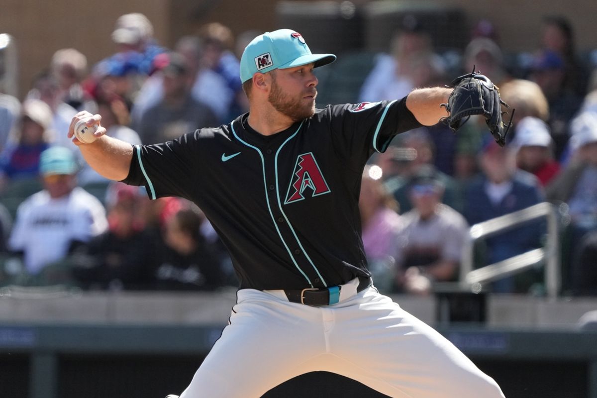 Mar 3, 2025; Salt River Pima-Maricopa, Arizona, USA; Arizona Diamondbacks pitcher Corbin Burnes (39) throws against the Chicago Cubs in the first inning at Salt River Fields at Talking Stick. Mandatory Credit: Rick Scuteri-Imagn Images