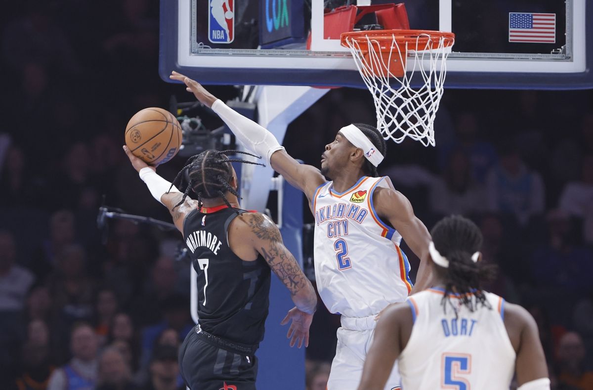 Mar 3, 2025; Oklahoma City, Oklahoma, USA; Oklahoma City Thunder guard Shai Gilgeous-Alexander (2) blocks a shot by Houston Rockets forward Cam Whitmore (7) during the first quarter at Paycom Center. Mandatory Credit: Alonzo Adams-Imagn Images
