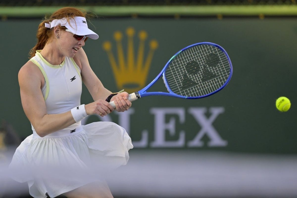 Mar 3, 2025; Indian Wells, CA, USA;  Maya Joint (AUS) hits a shot as she defeated Anastasia Zakharova (not pictured) in her qualifying at the BNP Paribas open at the Indian Well Tennis Garden. Mandatory Credit: Jayne Kamin-Oncea-Imagn Images