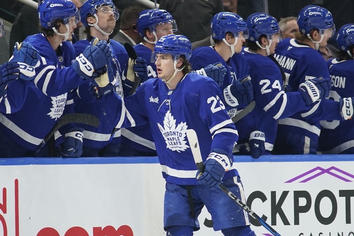 Mar 3, 2025; Toronto, Ontario, CAN; Toronto Maple Leafs forward Matthew Knies (23) gets congratulated after a goal against the San Jose Sharks during the second period at Scotiabank Arena. Mandatory Credit: John E. Sokolowski-Imagn Images