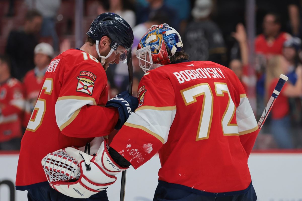 Mar 3, 2025; Sunrise, Florida, USA; Florida Panthers center Aleksander Barkov (16) and goaltender Sergei Bobrovsky (72) celebrate after the game against the Tampa Bay Lightning at Amerant Bank Arena. Mandatory Credit: Sam Navarro-Imagn Images
