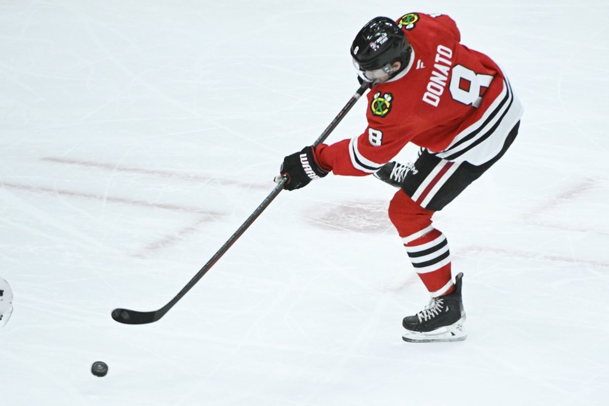 Mar 3, 2025; Chicago, Illinois, USA;  Chicago Blackhawks center Ryan Donato (8) takes a shot on goal against the Los Angeles Kings during the second period at the United Center. Mandatory Credit: Matt Marton-Imagn Images