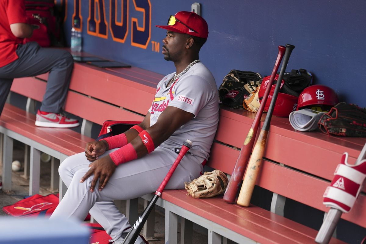 Mar 4, 2025; West Palm Beach, Florida, USA; St. Louis Cardinals outfielder Jordan Walker (18) reacts to a apparent knee injury against the Washington Nationals during the fourth inning at CACTI Park of the Palm Beaches. Mandatory Credit: Rich Storry-Imagn Images