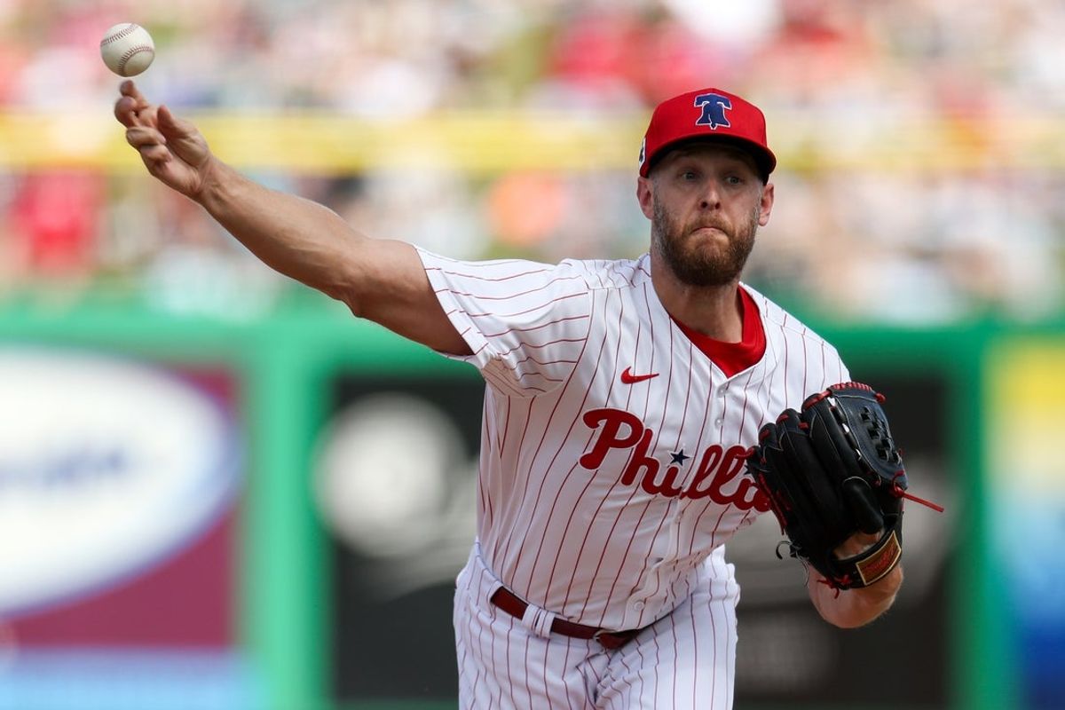 Mar 4, 2025; Clearwater, Florida, USA; Philadelphia Phillies pitcher Zack Wheeler (45) throws a pitch against the New York Yankees in the second inning during spring training at BayCare Ballpark. Mandatory Credit: Nathan Ray Seebeck-Imagn Images